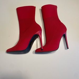 The cutest red boots to dress up or down! Only wore twice!